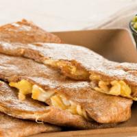 Egg And Cheese Quesadilla · Folded wrap filled with creamy scrambled eggs ＆ melted cheese grilled to perfection served w...