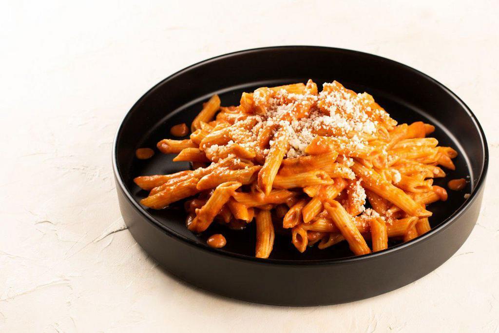 Penne alla Vodka · Penne, pink cream sauce, parmesan cheese.