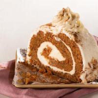 Carrot Cheese Slice · Moist and flavorful rolled in cream cheese frosting.