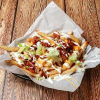 Home Style Fries  · Loaded cheddar-Jack, bacon, scallions. 