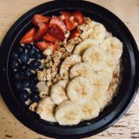 Strawberry Banana Bowl · Made to order with fresh ingredients! A blend of bananas and strawberries topped with sliced...