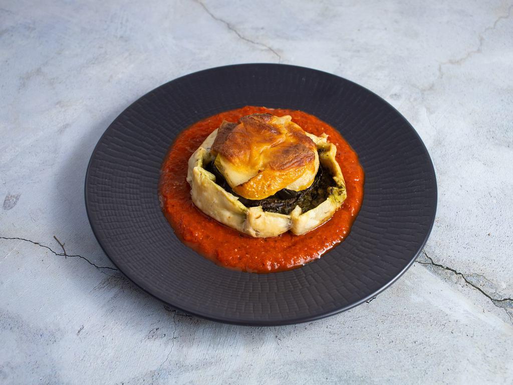 Roasted Vegetable Peasant Pies with Red Bell Pepper Sauce · Caraway pastry crust stacked with roasted vegetables and smoked mozzarella, served with red pepper coulis. Vegetarian.