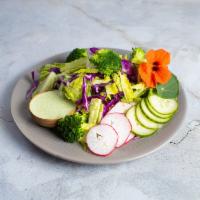 Crunchy Romaine Salad · Romaine, red cabbage, broccoli, cuke, radish, cilantro, jalapeno cilantro dressing.