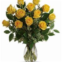 Dozen Yellow Long Stem Roses  · Vase of 12 roses with babies breath and mixed greens.