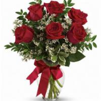 6 Red Roses in a Vase  · Vase of 6 roses with babies breath and mixed greens.

