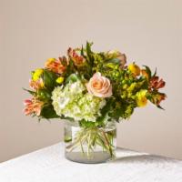 FTD Life's A Peach Bouquet · Garden style vase of flowers.
