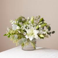 FTD Alluring Elegance Bouquet · Garden style vase of flowers.
