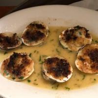 Baked Clams Oreganata · Little necks topped with our house flavored bread crumbs.