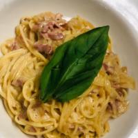 Spaghetti Alla Carbonara · Guanciale, Onion & Pecorino cheese.