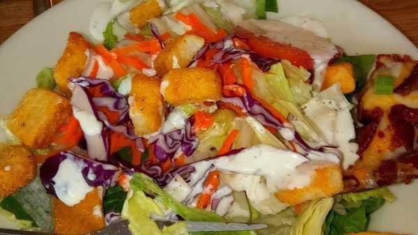 Garden Salad · Iceberg mix, carrots, cucumbers, tomatoes, and grated cheddar.