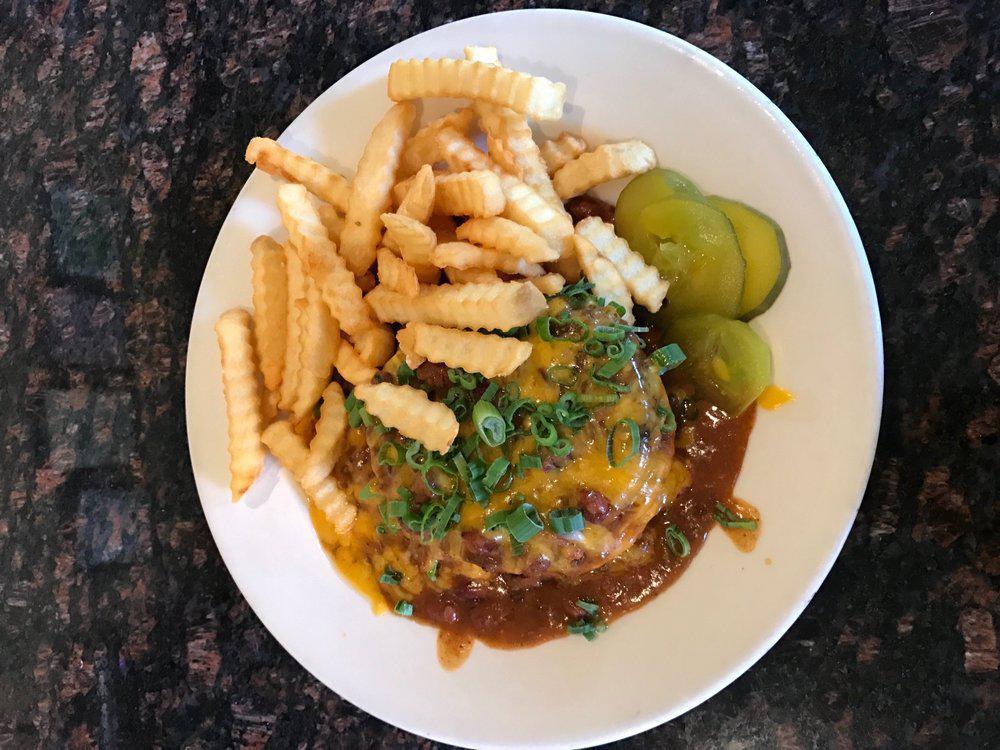 Chili Burger · Open face topped with chili con carne, cheddar and green onions.
