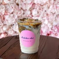 Iced Hojicha Latte · Roasted green tea latte with choice of milk and sugar.