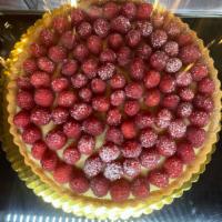 Raspberry Tart · Home made style Raspberry tart made with fresh seasonal raspberries. Sold as a slice or as a...
