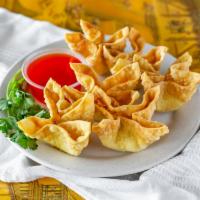 5. Crab Rangoon  · 6 pieces. Fried wonton wrapper filled with crab and cream cheese.