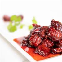 A9. Sweet and Sour Pork Ribs · Fried pork short ribs in vinegar and sugar sauce. Recommended.