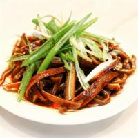 A13. Pig Ear Salad · Sliced pig ears braised with traditional Chinese spices. Served in spicy sauce. Mild spicy.