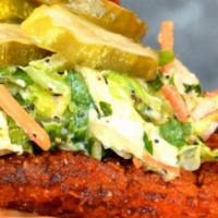 Hot Chicken Sandwich · Crispy Nashville hot chicken served on a bun with dill pickles, coleslaw and our signature l...