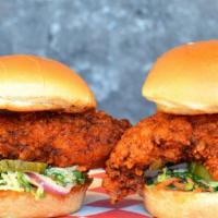 2 Chicken Sliders · Served with choice of two sides and lucky sauce or bastard ranch 
