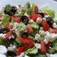 Greek Salad · Romaine Lettuce, Red cabbage, Cucumbers, Green Olives, Red onions and Feta Cheese Served wit...