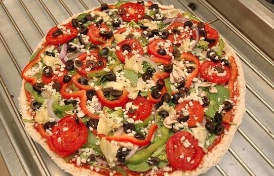 Vegetarian Pizza · Mushrooms, onions, green peppers, black olives and fresh tomatoes.