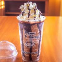K'La Frozen Mocha · Vanilla, chocolate syrups, cocoa, espresso dairy, blended with ice, topped with whipped cream.