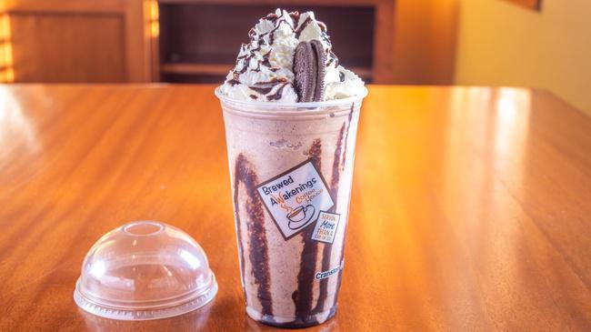 Oreo Crush · Oreo cookie, chocolate sauce, vanilla syrup, dairy, blended with ice, topped with whipped cream.