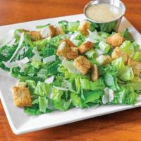 Caesar Salad · Romaine lettuce, croutons, shaved parmesan cheese, and caesar dressing.