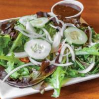 Garden Salad · Mixed greens, grape tomatoes, cucumbers, red onion, and choice of dressing.