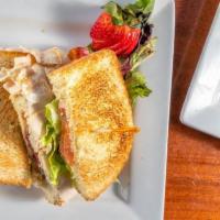 Turkey Club · Oven roasted turkey, bacon, lettuce & tomato with mayo on your choice of bread.