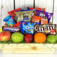 Spring It On Fruit and Snack Basket · A cheerful basket of healthy fruit and delicious snacks to brighten up anyone's day! (Conten...