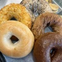 Assorted Bagels · Enjoy a bagel with butter, jelly and cream cheese.