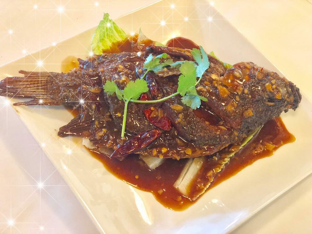 Honey Whole Fish · Deep fried whole tilapia tossed with honey, soy sauce, ginger and garlic