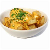 Patatas Bravas · Fried Potatoes with Spicy Mayo and aioli
Lactose-free, Nuts-free