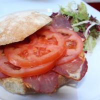 Mollete de Lomo Iberico con tomateTO GO · Iberian loin and tomato Sandwich
