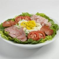 Italian Chef Party Salad · Serves 10 guests. Mixed greens, baby spinach, crispy heritage pepperoni, shaved ham, salami,...