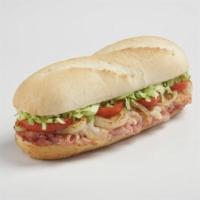 Big Ham and Cheese Sub · Shaved ham, smoked provolone cheese, fresh lettuce, freshly cut Roma tomatoes, yellow onions...