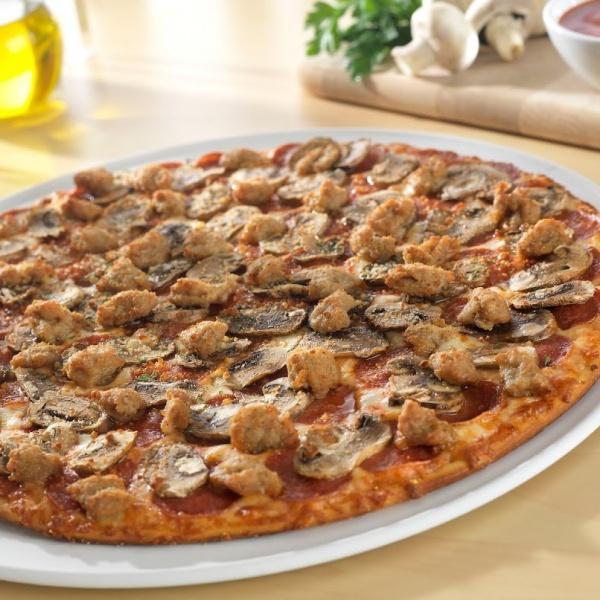Classic Trio Pizza · Heritage pepperoni, fresh mushrooms, family-recipe sausage.