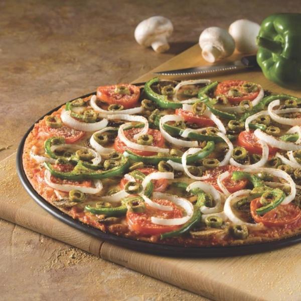 Very Veggie Pizza · Freshly cut Roma tomatoes, green peppers, yellow onions, fresh mushrooms, baby spinach and banana peppers. Vegan.