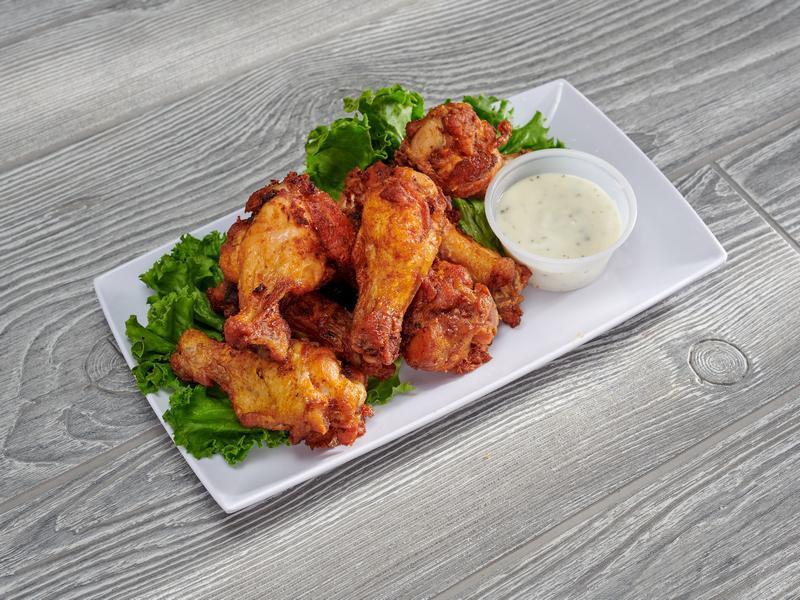 Chicken Wings · House-made, choice of ranch, blue cheese, BBQ or Buffalo sauce. Extra sauce for an additional charge.