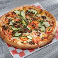 Dolores Park Pizza · Veggie pizza. Tomatoes, fresh basil, zucchini, mushrooms and red sauce.
