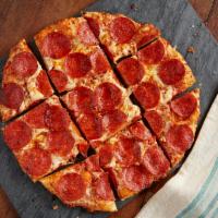 Extra-Large Super Roni · 16 Slices. A crazy amount of pepperoni. Seriously, count them!