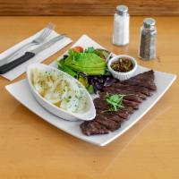 Churrasco · Skirt beef. A juice tender skirt steak and grilled to your liking. Served with chimichurri, ...