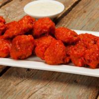 Boneless Wings · 1 pound.  Plump, tender all white meat Boneless Chicken, breaded and baked, then tossed in y...