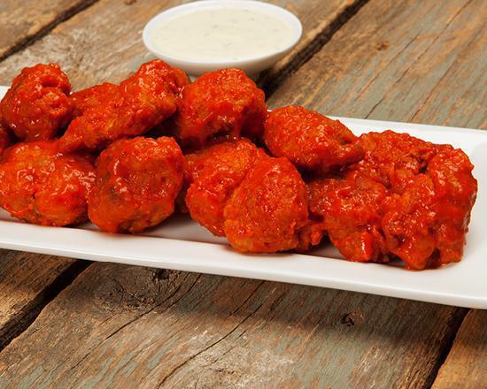 Boneless Wings · 1 pound.  Plump, tender all white meat Boneless Chicken, breaded and baked, then tossed in your favorite sauce and served with your choice of dipper.