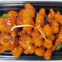 C12. Orange Flavor Chicken · Battered and cooked in a sweet orange sauce. Hot and spicy.