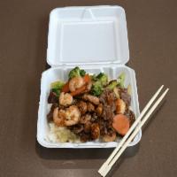 Teriyaki Chicken and Beef · Comes with steamed white rice or fried rice.