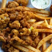 Alligator Basket · Mustard battered and fried. Served with Cajun fries, hush puppies, and creole mayo.