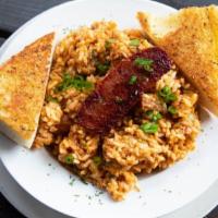 Cajun Jambalaya · Andouille sausage, chicken, veggie trinity, white rice.