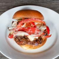 Pot Roast Sandwich · Braised Beef on Brioche Bun w/ sweet peppers , onion & melted provolone cheese 