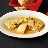 Pollo Marsala · Chicken breasts simmered in Marsala wine, mushrooms and herbs paired with polenta cakes.